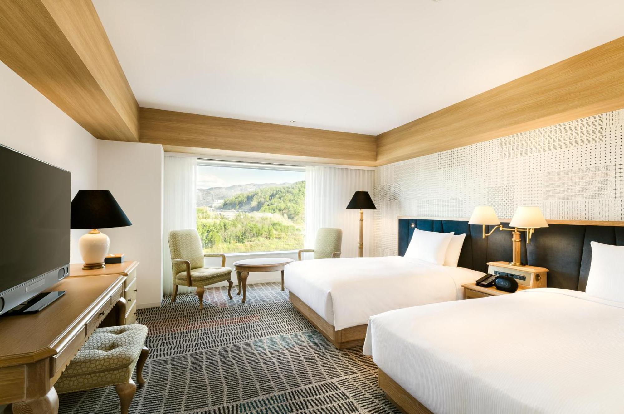 Quarto com 2 Camas de Solteiro - Andar Alto